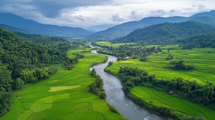 Aerial Landscape in Scenic Pong Nam Valley with Lush Greenery and Peaceful Waterway