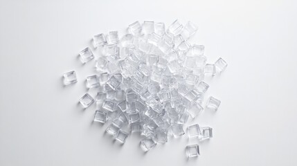 Fototapeta premium Pile of Clear Ice Cubes on White Background for Beverage and Food Use