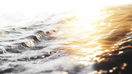 A close-up view of a river's surface, the water illuminated by the sun's rays, glowing with a golden tint as the gentle ripples distort the shimmering reflections.