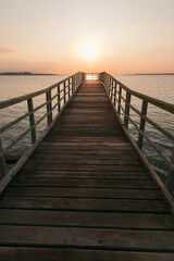 Naklejka premium ocean boardwalk in golden light.