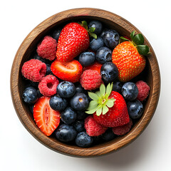 Obraz premium A wooden bowl filled with a mix of fresh strawberries, raspberries, and blueberries.
