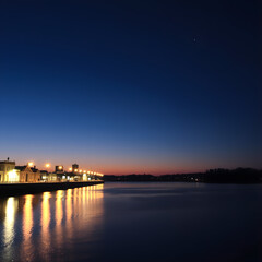 Naklejka premium sunset over the river
