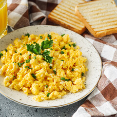 Scrambled Eggs and Juice Delicious Breakfast Meal with Toast and Fresh Ingredients