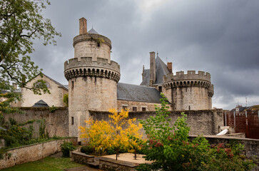 A tranquil view of Le Château des Ducs from Parc Simone Veil (cours du château des Ducs) in Alençon, Normandy, France