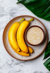 Fresh Tropical Fruits on Plate with Creamy Smoothie and Green Leaves