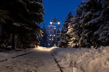 Night photo of the old Orthodox church in Almaty, a famous tourist spot in the park.