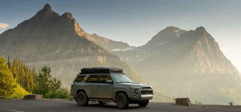 Toyota 4Runner Sits In Parksing Spot On Gong To The Sun Road With Mount Oberlin In The Background