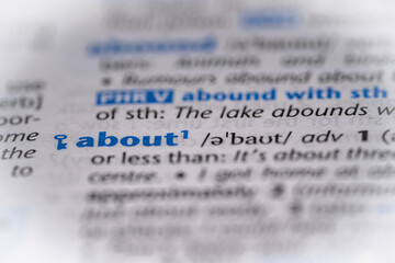 About word in a dictionary. Selective focus, close up.