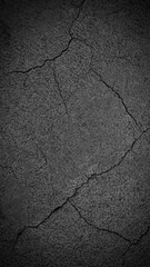 Obraz premium Dark Cracked Surface Texture Ideal for Background and Design Use