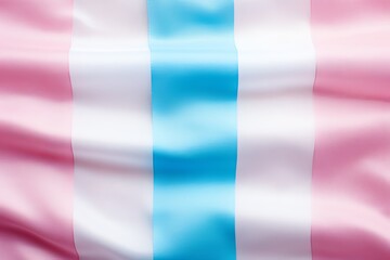 Close up of the transgender pride flag featuring stripes of white, pink, and blue colors