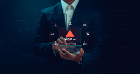 Concept alert or warning, Technology scam, businessman showing warning of access to malicious cyber...