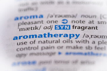 Aromatherapy word in a dictionary. Selective focus, close up.