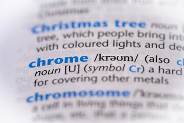 Chrome word in a dictionary. Selective focus, close up.