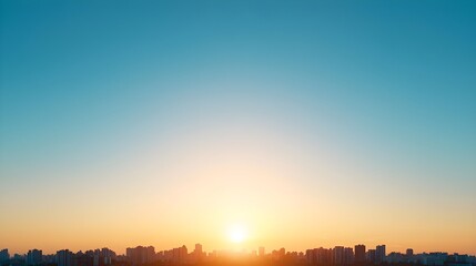 Fototapeta premium Beautiful Sunrise Over City Skyline with Clear Blue Sky