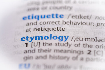 Etymology word in a dictionary. Selective focus, close up.