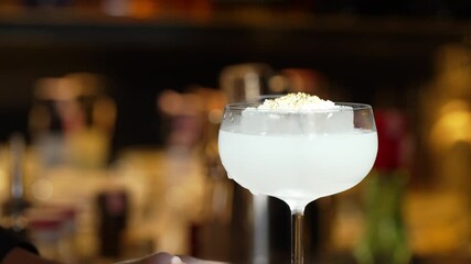 Closeup vodka cocktail with bartender burning fire into sugar presentation on luxury counter bar at nightclub. Special refresh drink showcasing nightlife mixology inviting bokeh warm light. Vinosity.