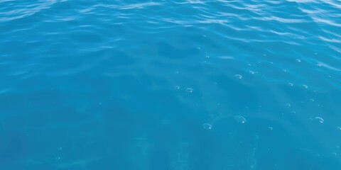 Calm waters with clear blue surface and air bubbles rising from the water's surface, underwater world, natural scenery