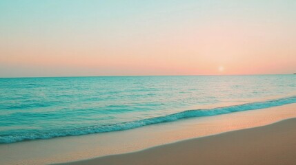 Obraz premium Tropical Beach with Soft Waves and Pastel Sunset Sky – Relaxing Coastal Landscape