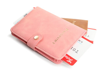 Two passports with tickets isolated on white