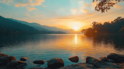 A panoramic view of a tranquil lake at twilight,