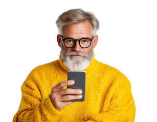 Senior man in yellow sweater uses smartphone with confidence and style in modern digital lifestyle