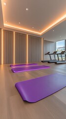 Modern gym with purple yoga mats and treadmills.