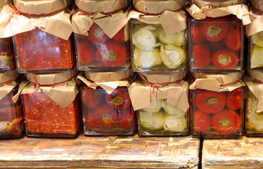 peppers and vegetables preserved in glass jars in oil packaged in the southern Italian country