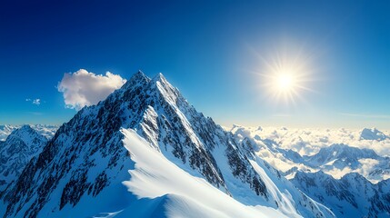 Stunning Snow-Capped Mountain Peak Against Clear Blue Sky