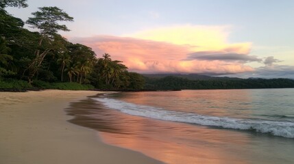 Fototapeta premium Tropical Beach with Soft Waves and Pastel Sunset Sky – Relaxing Coastal Landscape