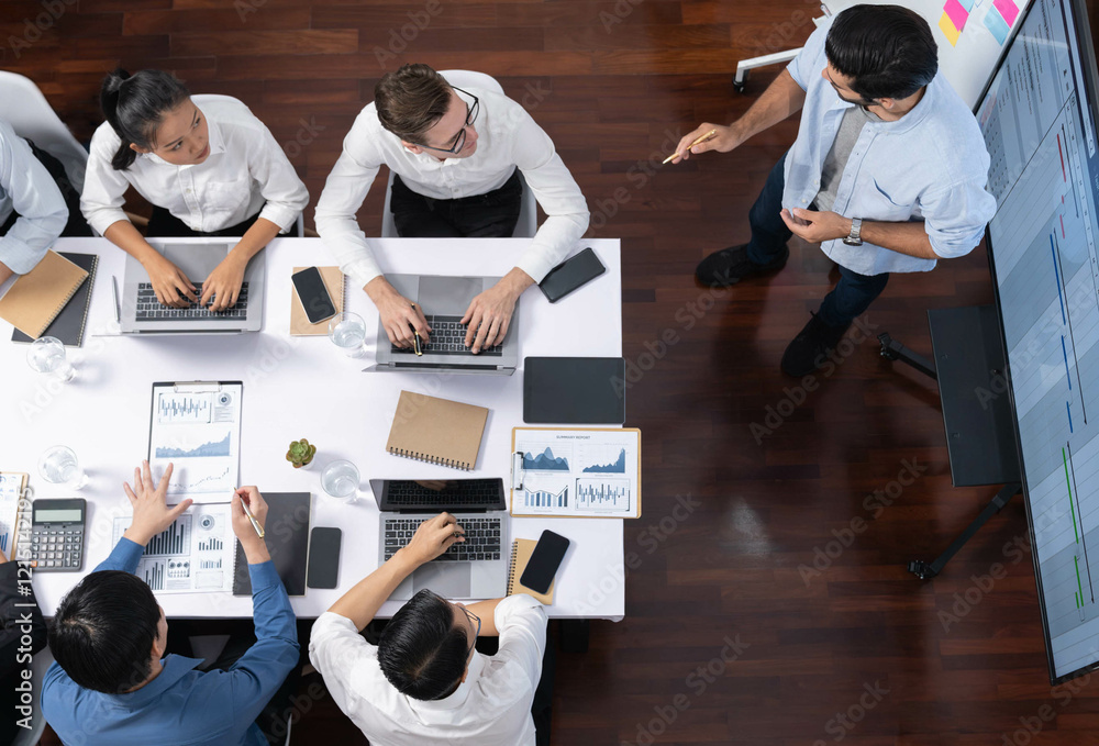 Leinwandbilder top view analyst team utilizing bi fintech to analyze financial data at table in meeting room. analy