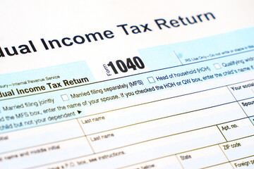 Close up of United States federal income tax return IRS 1040 documents