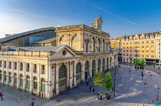 Gare de Lille-Flanders railway station in Lille city historical center. Art Deco and Neo-Flemish architecture style building with arched windows and clock tower. French Flanders, Northern France