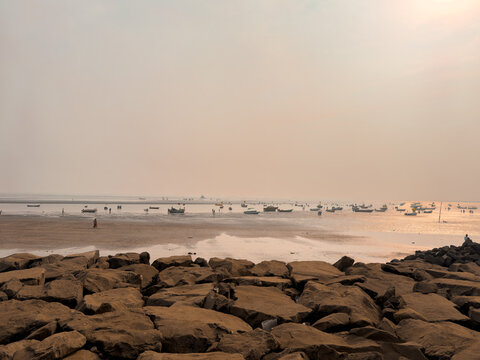 Floating boats on the beach of Alibagh, Maharashtra, India