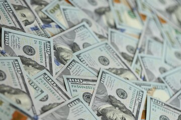 Big amount of american USD hunderd dollar bills banknotes close up