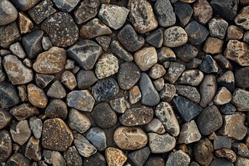 Naklejka premium Image of Brown pebble stone paving surface. Texture for background usage