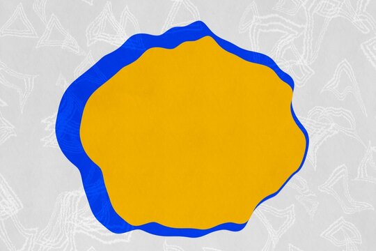 Abstract blue and yellow shape on textured background