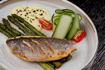 Close-Up of Grilled Sea Bass with Asparagus.