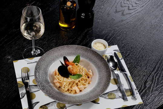 Seafood Linguine with Creamy Sauce and Parmesan.