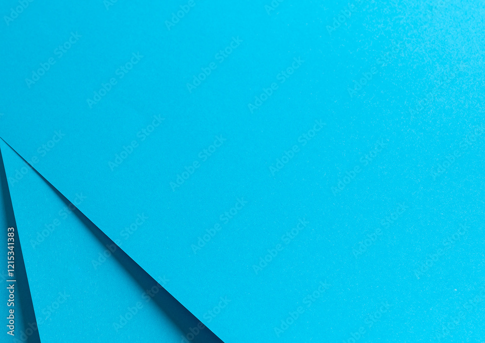 Poster Blue paper background with a smooth matte finish and sharp geometric edges. Delicate pastel tones and vibrant contrasts create a polished, elegant, and contemporary design with a harmonious and