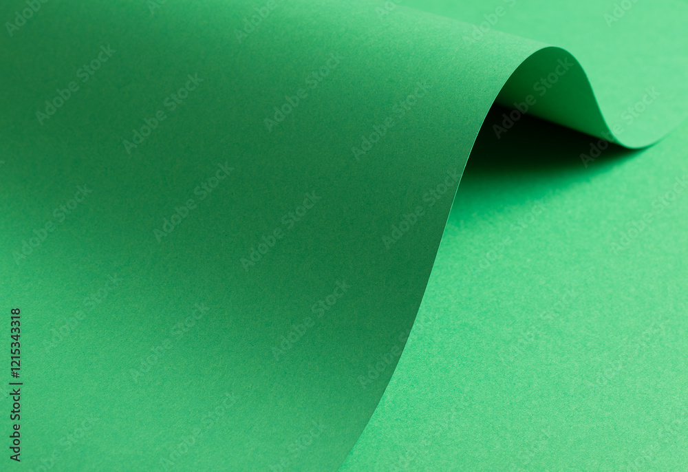 Poster eden green paper background with a smooth matte finish and flowing curved elements. vibrant, saturat