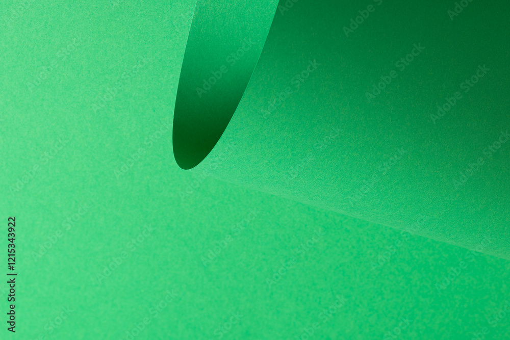 Poster eden green paper background with a smooth matte finish and softly curved elements. vibrant, vivid to
