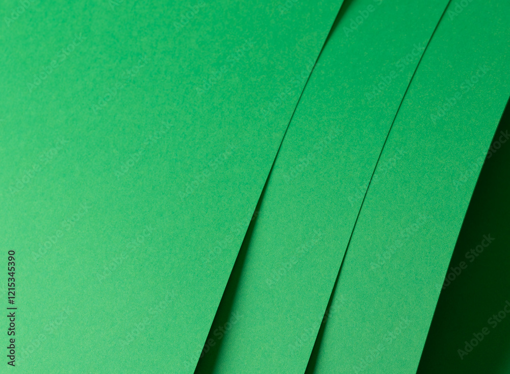 Poster eden green paper background with vertical, layered sheets and a smooth matte finish. bright, vibrant