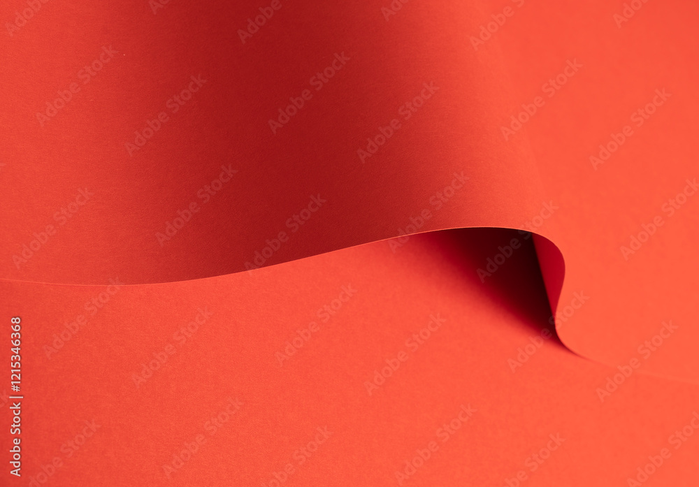 Poster Fiesta red and orange paper background with a matte finish and smooth, curved folds. Rich, saturated tones and flowing textures create a vibrant, bold, and elegant design with depth and dynamic