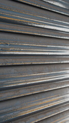 Photograph of texture of a grey-coloured metal shutter