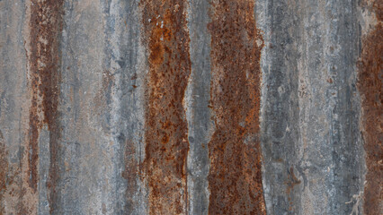 Texture of an old rusted grey metal shutter