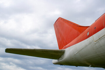 The tail section of an old airplane.