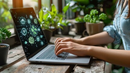 Businesswoman typing on laptop with risk management hologram and iconography displayed