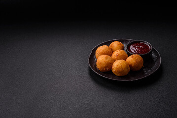 Crispy French fries with mozzarella cheese with raspberry sauce