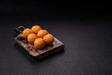 Crispy French fries with mozzarella cheese with raspberry sauce