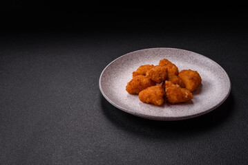 Brie cheese or camembert fries in breading, fast food, takeaway